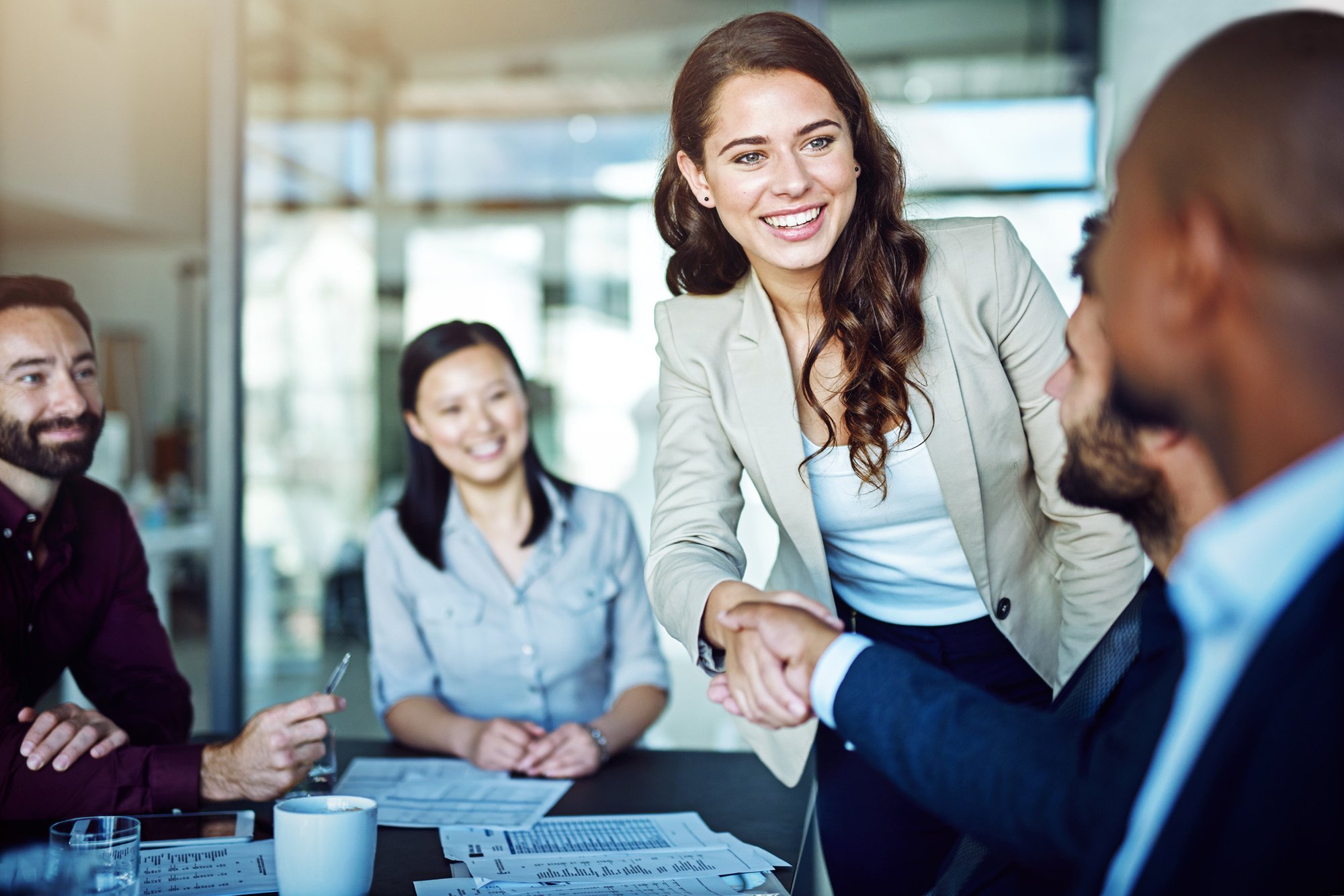 iStock-Group_Office_woman_Shake